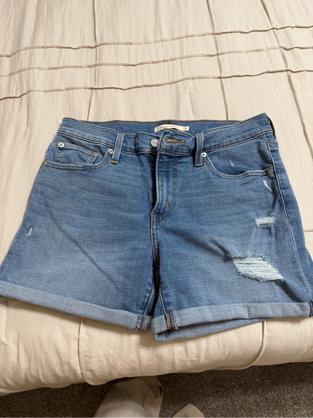 Levi's Medium Blue Distressed Rolled-Hem Jean Shorts